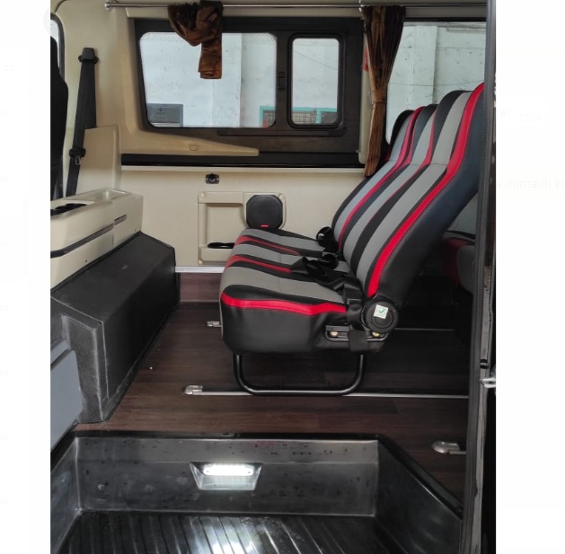 Isuzu ELF Microbus 20 seat Deluxe New Armada - pintu samping kursi